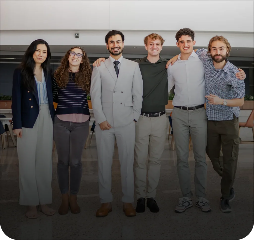 Six members of the Icon Pro Solutions team standing together in an office