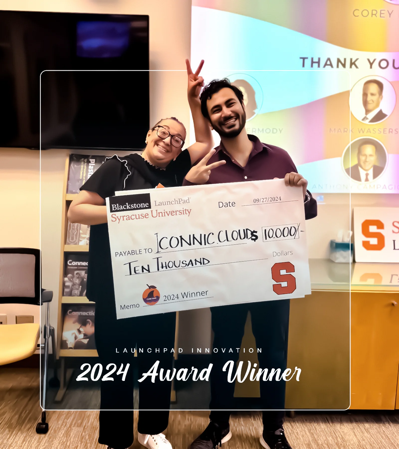 Waqar Hussain, Icon Pro Solutions CEO, with Iconnic.Cloud receiving a $10,000 check as a 2024 'Cuse Tank winner