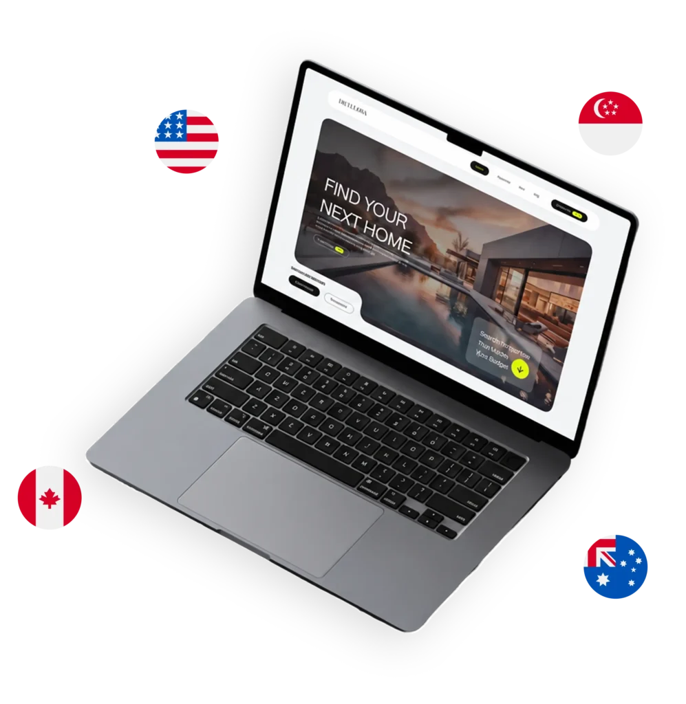 Laptop showing a real estate website, surrounded by the flags of the United States, Canada, Singapore and Australia