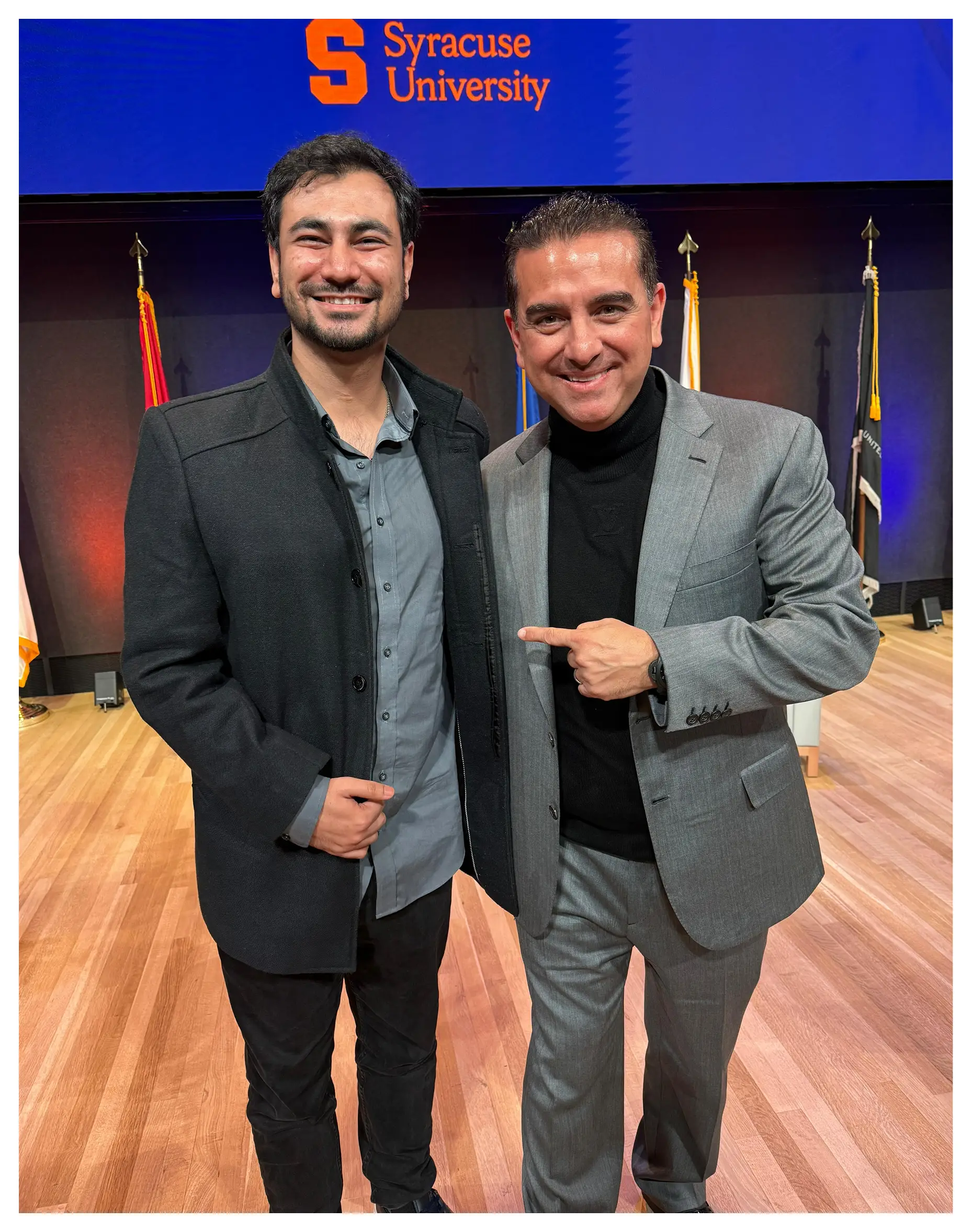 Two men at a Syracuse University event