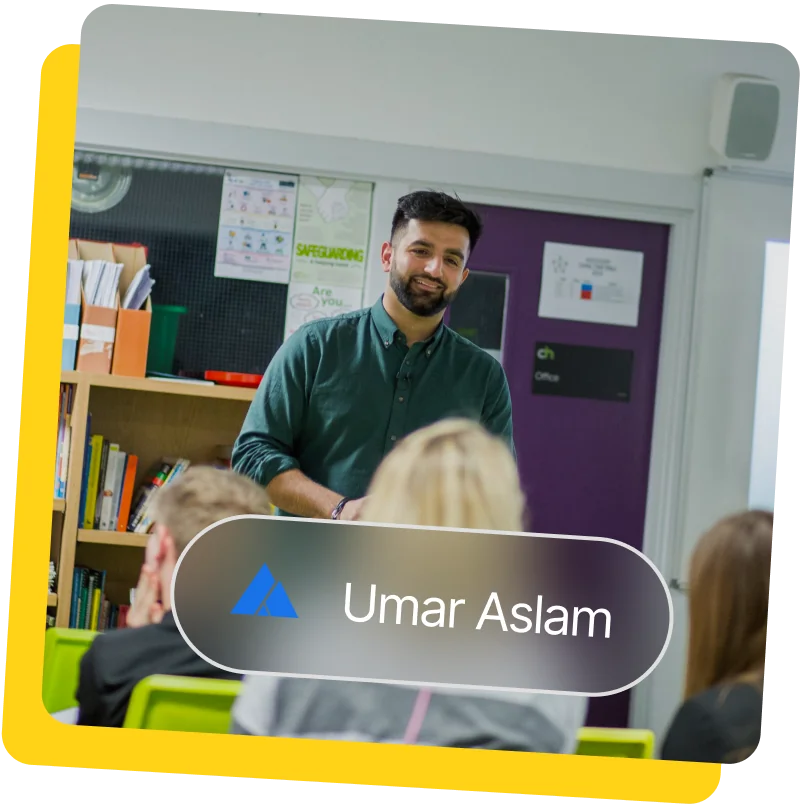 Umar Aslam teaching a classroom of students